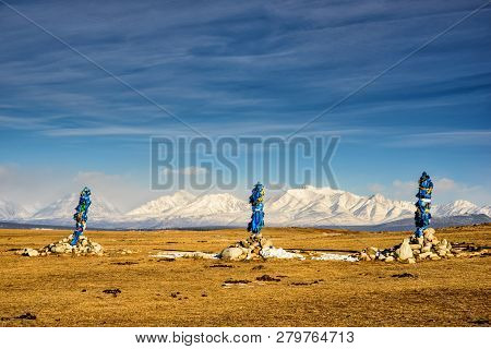 Sacred Place With Obo. Winter Landscape Of Mongolia. Lake Khubsugul And Mountain