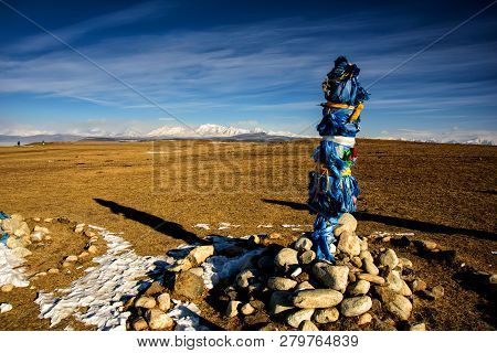 Sacred Place With Obo. Winter Landscape Of Mongolia. Lake Khubsugul And Mountain