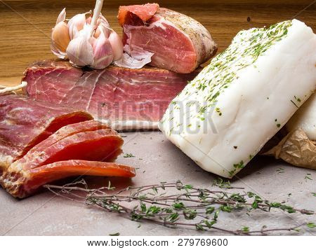 Chunks Of Salted Bacon Jerky Healthy Food With Pranami Spices And Herbs. Fat, Lard, Ham,