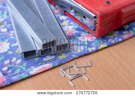 Tacker And Staples Used To Upholster Furniture. Accessories For Employees In The Carpentry Shop.