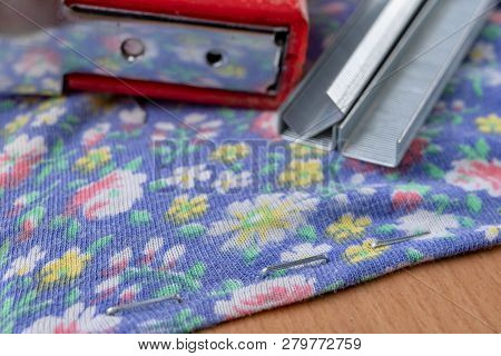 Tacker And Staples Used To Upholster Furniture. Accessories For Employees In The Carpentry Shop.