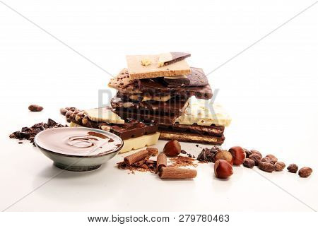 Chocolate Bars On Table With Chocolate Tower.