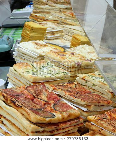 Shop Counter Specialized In Focaccia And Stuffed Pizzas In Italy