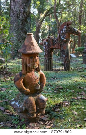 Miyazaki, Japan - November 5, 2018:  Haniwa Garden in Heiwadai Park with earthenware replicas of burial statues found all over the country in Japan
