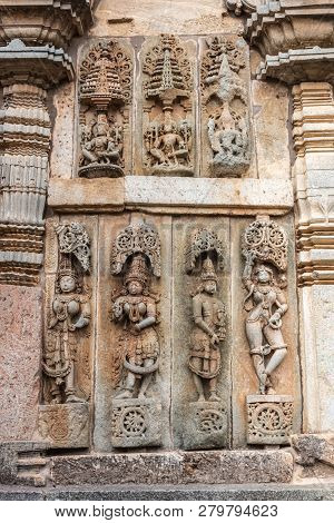 Belur, Karnataka, India - November 2, 2013:  Chennakeshava Temple. Large Brown Wall Stone Side Panel