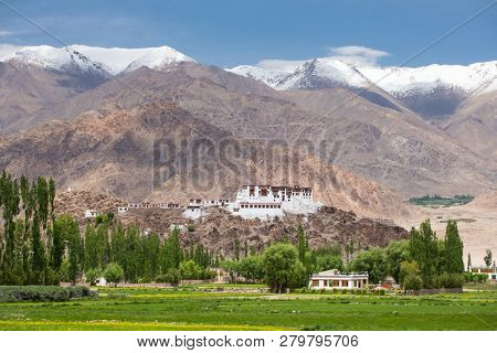Stakna gompa temple ( buddhist monastery ) with a view of Himalaya mountains in Leh, Ladakh, Jammu and Kashmir, India.