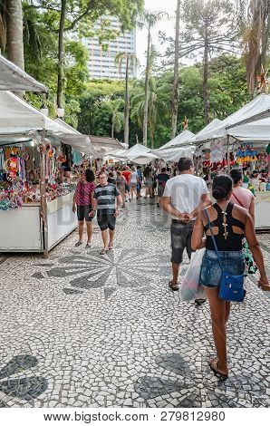 Curitiba - Pr, Brazil - December 15, 2018: Shops Selling Food And Crafts At Open Air Fair At Feira D