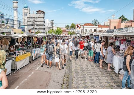 Curitiba - Pr, Brazil - December 16, 2018: People At The Sundays Fair Called Feira Do Largo Da Ordem