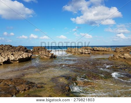 Rocky Shore At Beach With Tidepools In Isabela, Puerto Rico