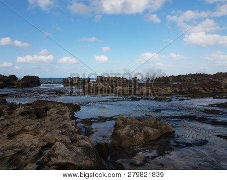 Rocky Shore At Beach With Tidepools In Isabela, Puerto Rico