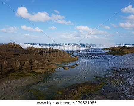 Rocky Shore At Beach With Tidepools In Isabela, Puerto Rico