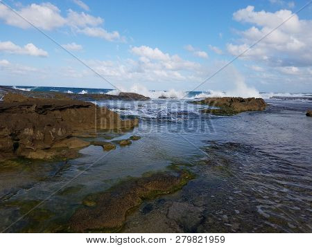 Rocky Shore At Beach With Tidepools In Isabela, Puerto Rico