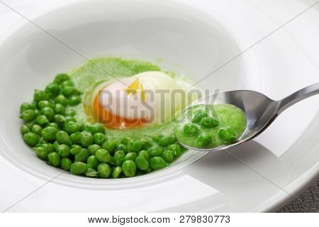 tear peas with poached egg, spanish basque cuisine
