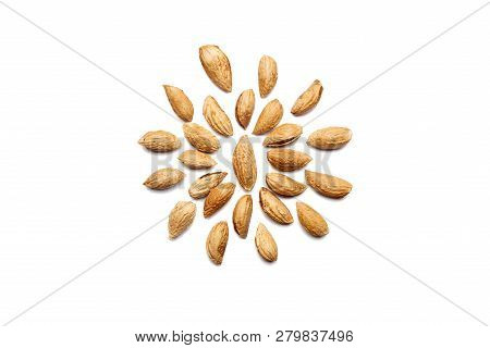 Pattern Of Nuts - Peeled Almonds Badam On A White Background In The Form Of A Circle. Concepts About