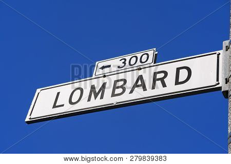 A Street Sign For The Winding Road, Lombard Street In San Francisco, California, Usa