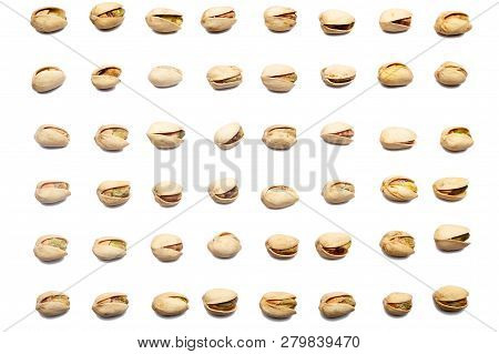 Inshell Pistachios And Cracked Pistachios On White Background, Top View. Pistachio Nuts Pattern