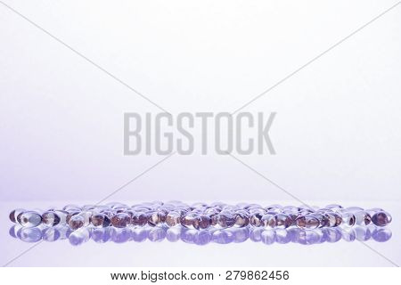 Fish Oil Supplement Capsules Isolated On White Background