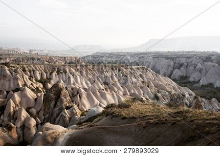 Amazing sunrise in Cappadocia mountains, Turkey. Travel landscape photography
