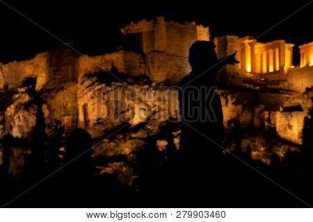Silhouettes Of Tourists, Visitors And Locals At The Acropolis