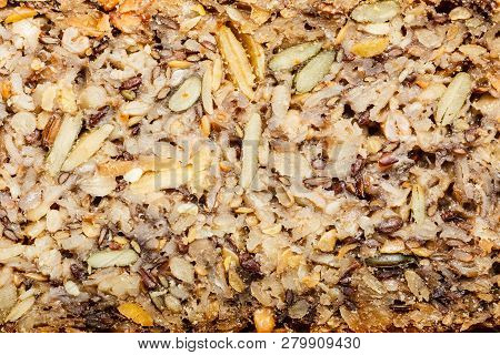 Food Textures And Patterns Concept. Detailed Closeup Of Whole Grain Bread With Many Big Grains