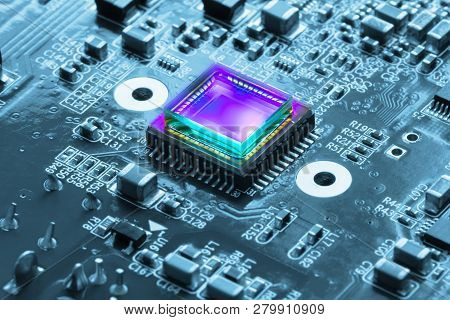 Photosensitive Sensor On A Printed Circuit Board Closeup With A Violet Glow