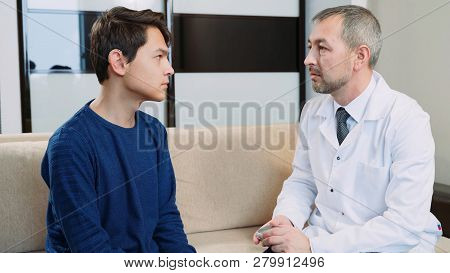 Hearing Impaired Young Man At The Doctors Office.