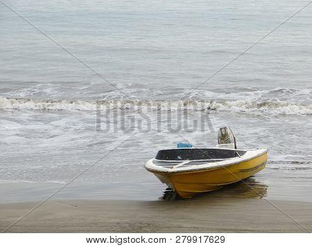 Anyer, Indonesia - June 26, 2018: A Motorboat Landed On The Sand Beach.