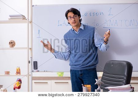 Young lecturer teacher teaching anatomy
