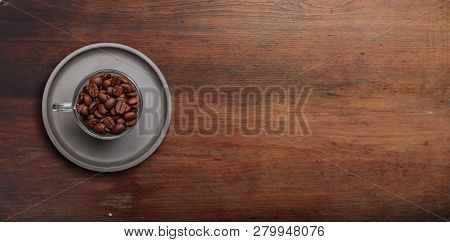 Coffee Cup And Beans On Wooden Background, Copy Space