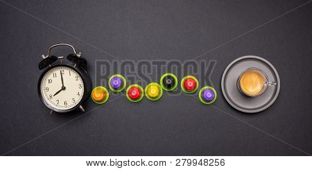 Alarm Clock And Espresso Capsules, Eco Friendly, Compostable On Black