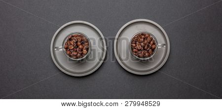 Coffee Cups And Beans On Black Color Background, Top View
