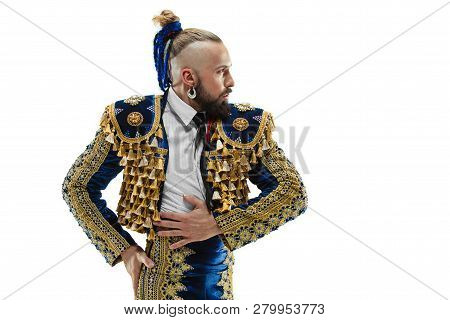 Torero In Blue And Gold Suit Or Typical Spanish Bullfighter Isolated Over White Studio Background. T