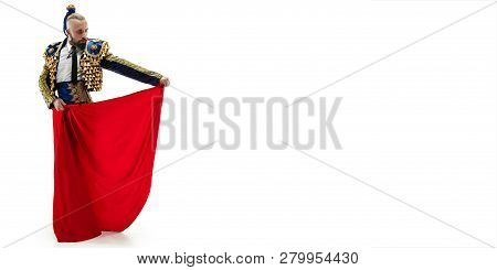 Torero In Blue And Gold Suit Or Typical Spanish Bullfighter Isolated Over White Studio Background. T