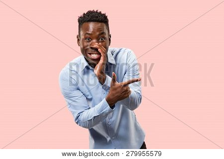 Secret, Gossip Concept. Young Afro Man Whispering A Secret Behind His Hand. Businessman Isolated On 