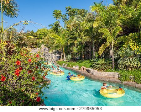 Adeje Coast, Tenerife, Spain - 10 January, 2019:  People Enjoy Floating On Lazy River In Siam Park I
