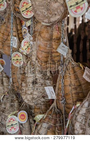 Parma, Italy - May 2018:delicious Culatello Forms Hanging Inside A Restaurant.