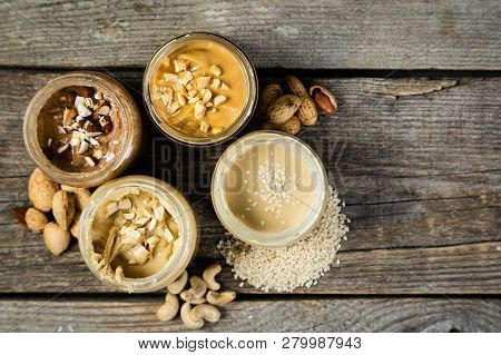 Selection Of Nut Butters - Peanut, Cashew, Almond And Sesame Seeds, Copy Space