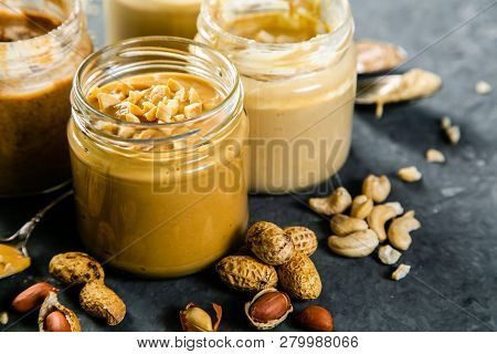 Selection Of Nut Butters - Peanut, Cashew, Almond And Sesame Seeds, Copy Space