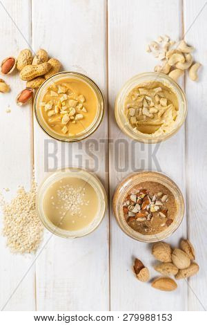 Selection Of Nut Butters - Peanut, Cashew, Almond And Sesame Seeds, Copy Space