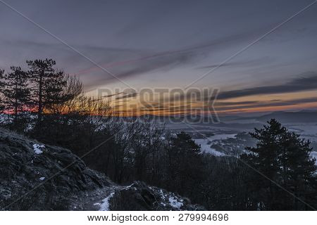 Sunrise On Boren Hill Near Bilina Town In Winter Frosty Color Morning