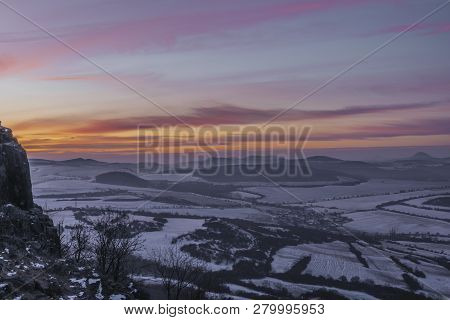 Sunrise On Boren Hill Near Bilina Town In Winter Frosty Color Morning