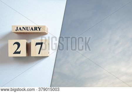 January 27, Blue Sky With Clound With Number Cube.