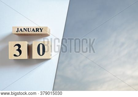 January 30, Blue Sky With Clound With Number Cube.