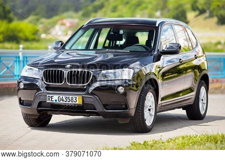 Grodno, Belarus - June 2020: Bmw X3 Ii F25 2.0i Xdrive Front Three Fourth View Outdoors On Sunny Roa