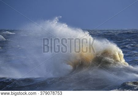 Stunning Image Of Individual Wave Breaking And Cresting During Violent Windy Storm With Superb Wave 