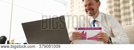 Man Without Trousers Shows Report In Front Laptop. Remote Team Management. Properly Organized Commun