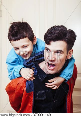 Faher And Son Together Having Fun At Home, Lifestyle Happy Family, People At Home