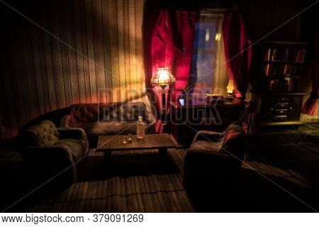 A Realistic Dollhouse Living Room With Furniture And Window At Night. Artwork Table Decoration With