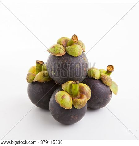 A Delicious Ripe Mangosteen On A White Background