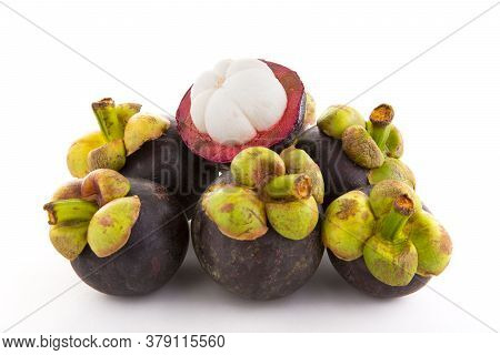 A Delicious Ripe Mangosteen On A White Background